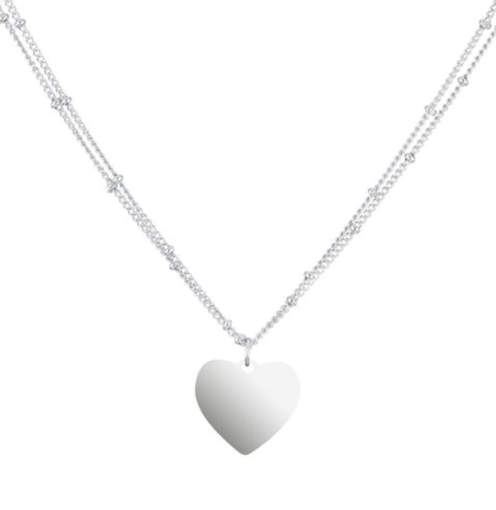 Layered silver necklace with heart pendant
